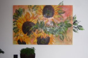 Bloemen van de zon (op muur)